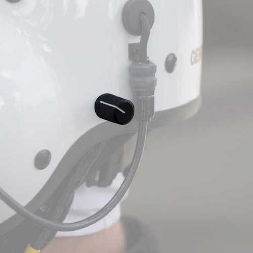 Perilla de control de volumen en el casco